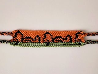 Bracciale Snoopy macramè 