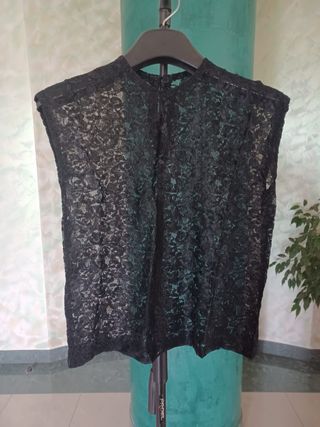 Canotta cucita a mano