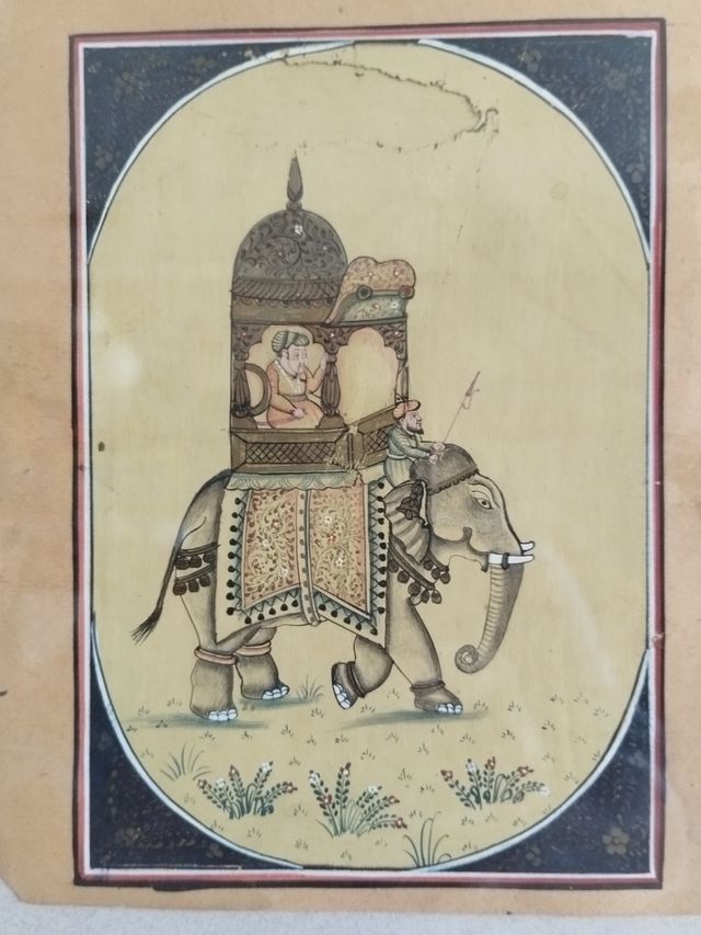 Dos hojas de libro indú,enmarcadas.