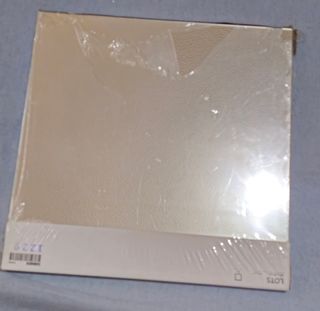 Espejo de pared con pegamento