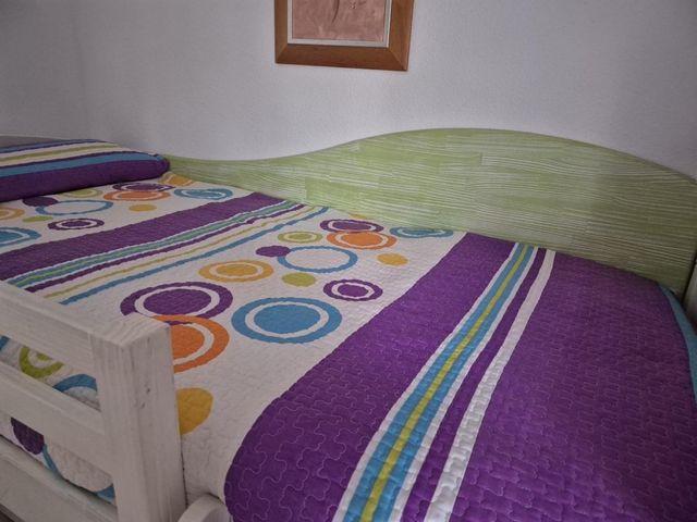 Cama doble de madera maciza Garabatos