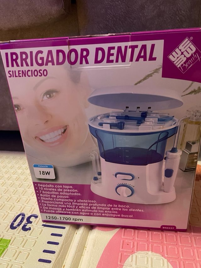 Irrigador dental