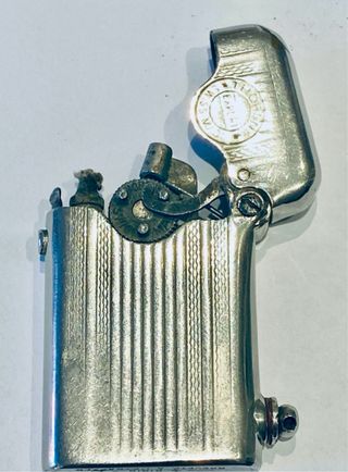 Antiguo encendedor Thorens Swiss Made. Años 20