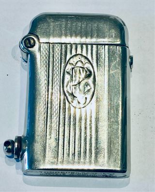 Antiguo encendedor Thorens Swiss Made. Años 20