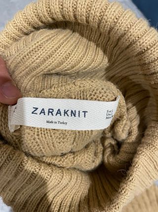 Jersey trenzado cuello vuelto