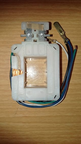 Bobina inductora motor limpiaparabrisas.