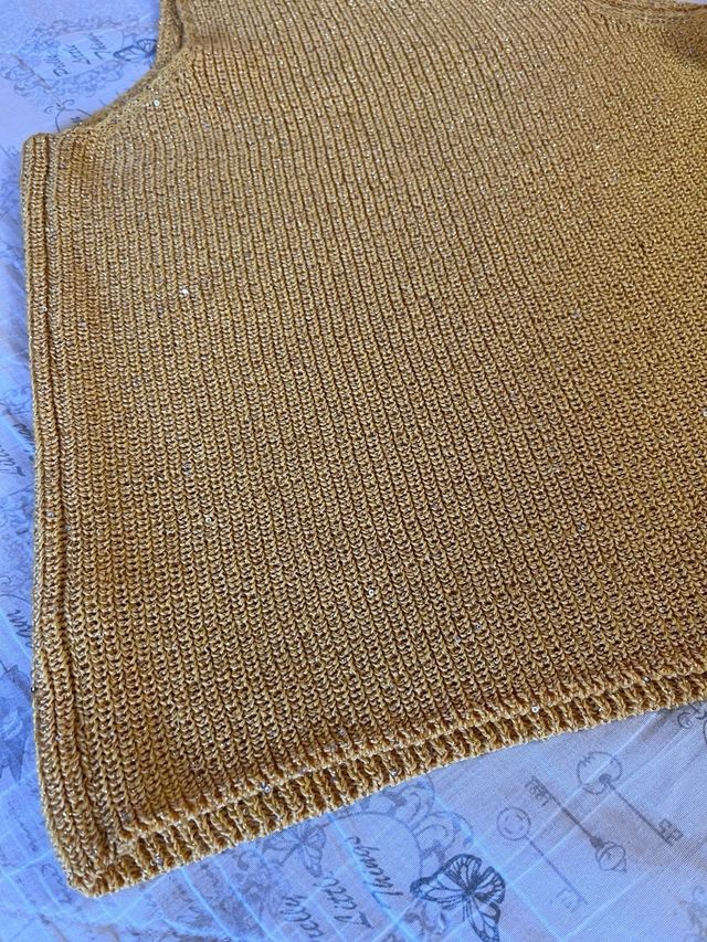 Jersey sin mangas con lentejuelas