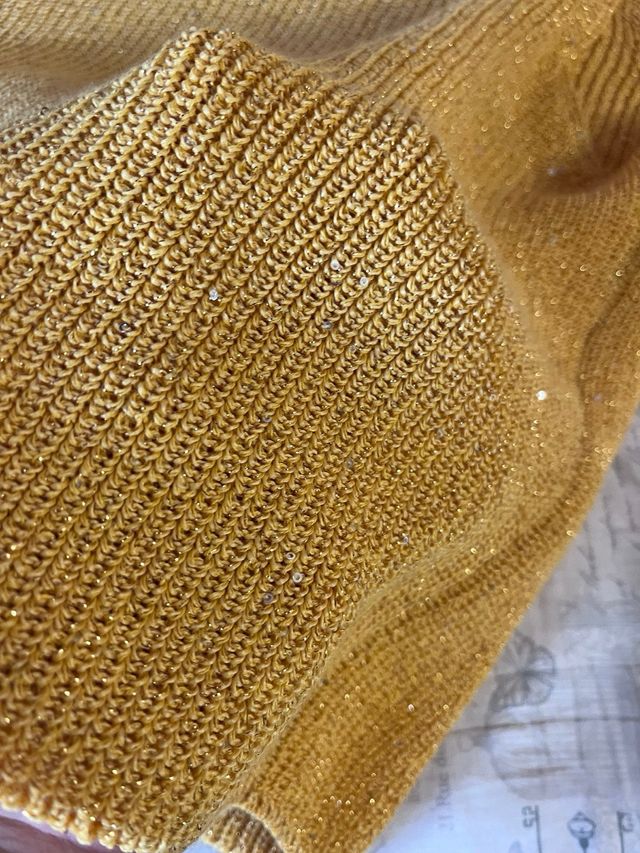 Jersey sin mangas con lentejuelas