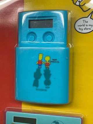 THE SIMPSONS SET DESPERTADOR Y CALCULADORA 2007