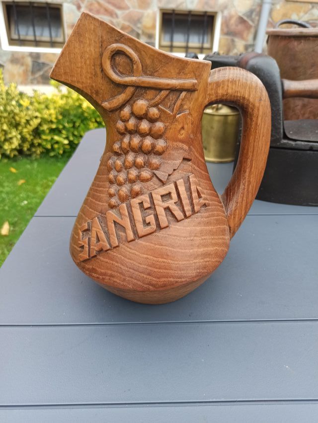 Jarra madera tallada.