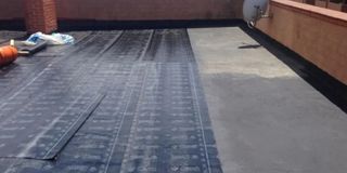 COLOCACIÓN DE TELA ASFALTICA