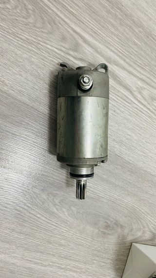 motor de arranque ,junta escape regulador elect ,