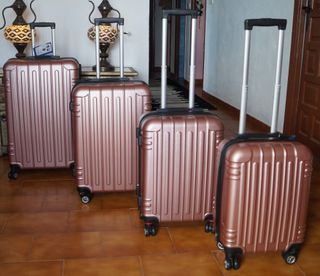 Set 4 Maletas color golden rose 8 Ruedas Giratoria
