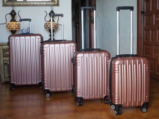 Set 4 Maletas color golden rose 8 Ruedas Giratoria
