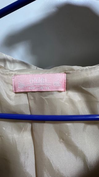 Chaleco acolchado beige largo