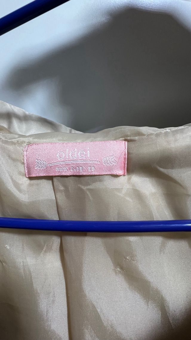 Chaleco acolchado beige largo