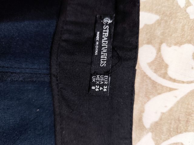 Minifalda polipiel Stradivarius T36