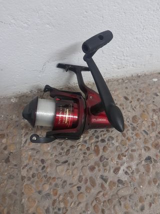 Carrete caña pescar