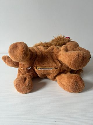 Perra Lucy de juguetes