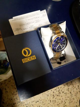 Reloj Biden Oro y Plata