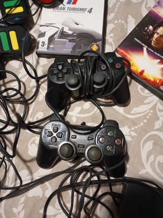Consola PS2 con muchos accesorios