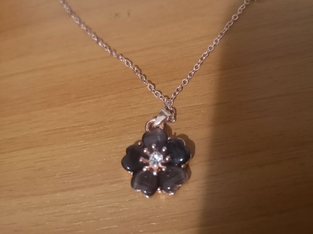 Set collana orecchini fiore nero