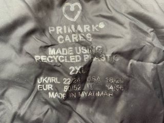 Abrigo mujer negro plumas