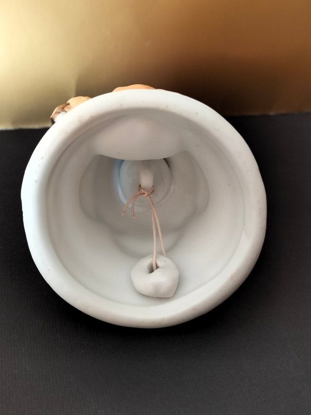 Campana natalizia in ceramica