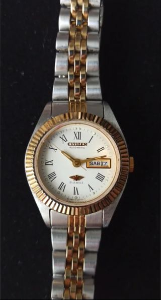 Reloj automático Citizen acero y oro 