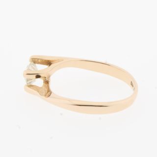 Anillo 4 garras con brillante
