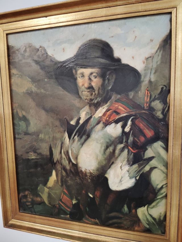 Cuadro marco dorado sobre tabla.