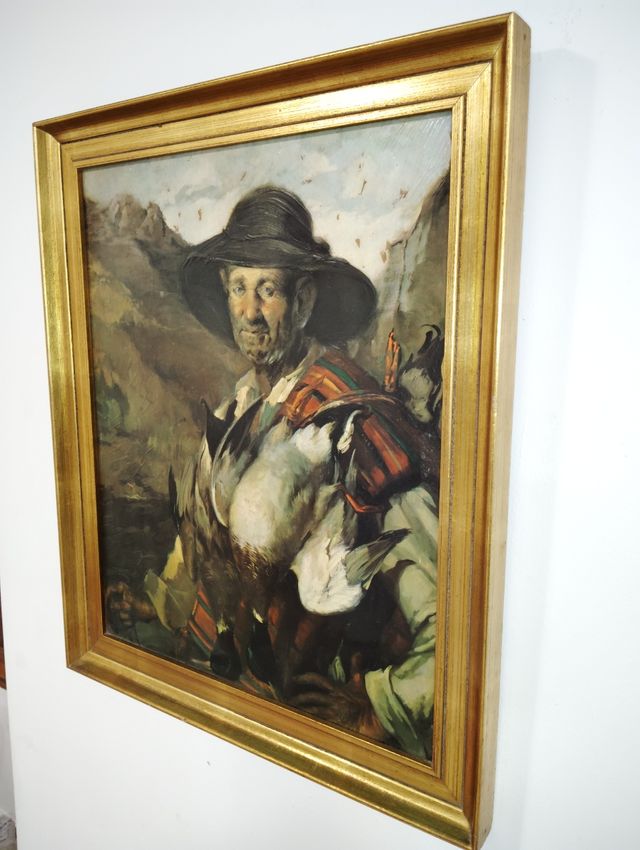 Cuadro marco dorado sobre tabla.