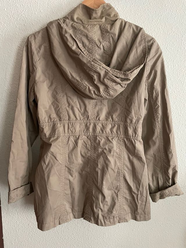 Trench gabardina System action