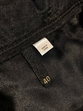 Gonna corta a vita alta elegante con bottoni