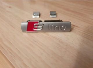 1 insignia/emblema Sline parrilla delantera,mate.