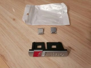 1 insignia/emblema Sline parrilla delantera,mate.