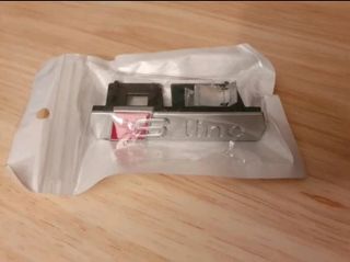 1 insignia/emblema Sline parrilla delantera,mate.