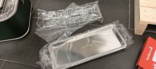 Supporto per cuocere cosce di pollo su barbecue