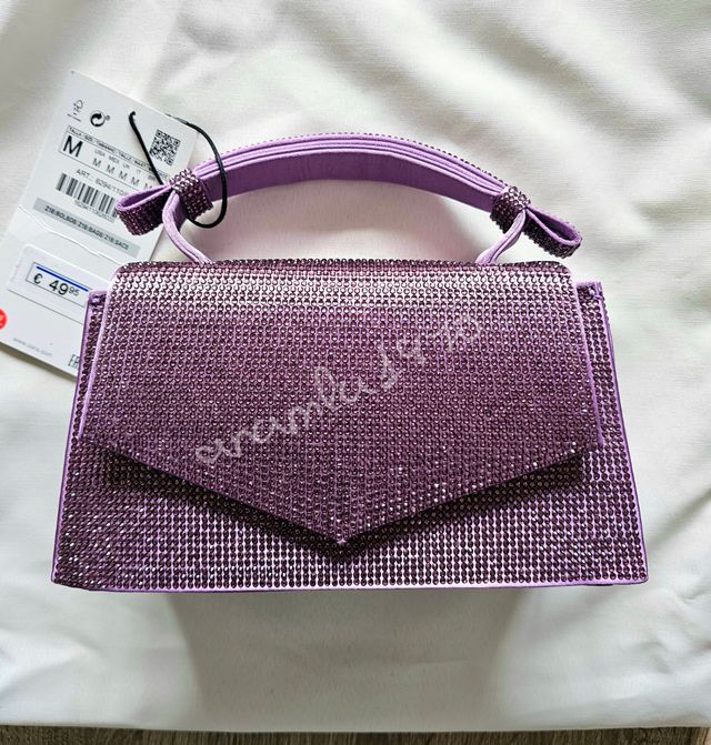 Bolso mini city brillos morado zara de segunda mano por 20 EUR en