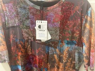 VESTIDO DESIGUAL CON ETIQUETA