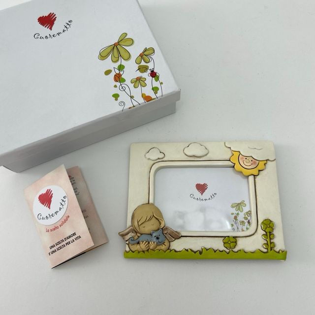 Nuova cornice per foto, ceramica