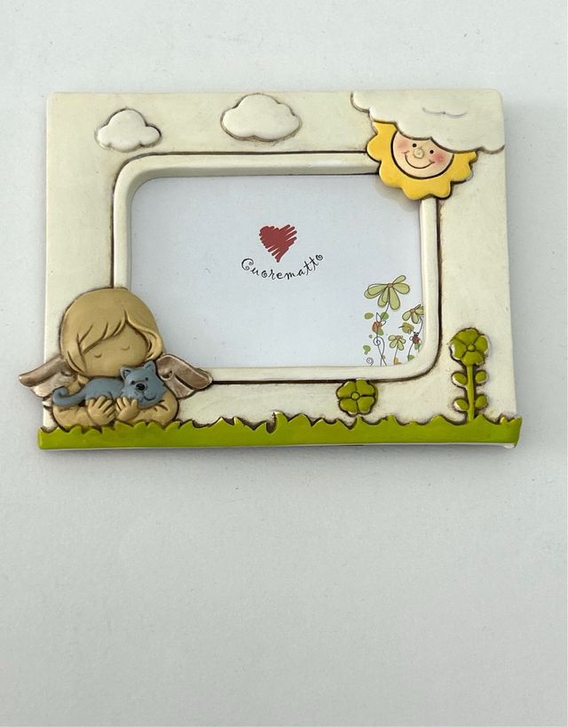 Nuova cornice per foto, ceramica