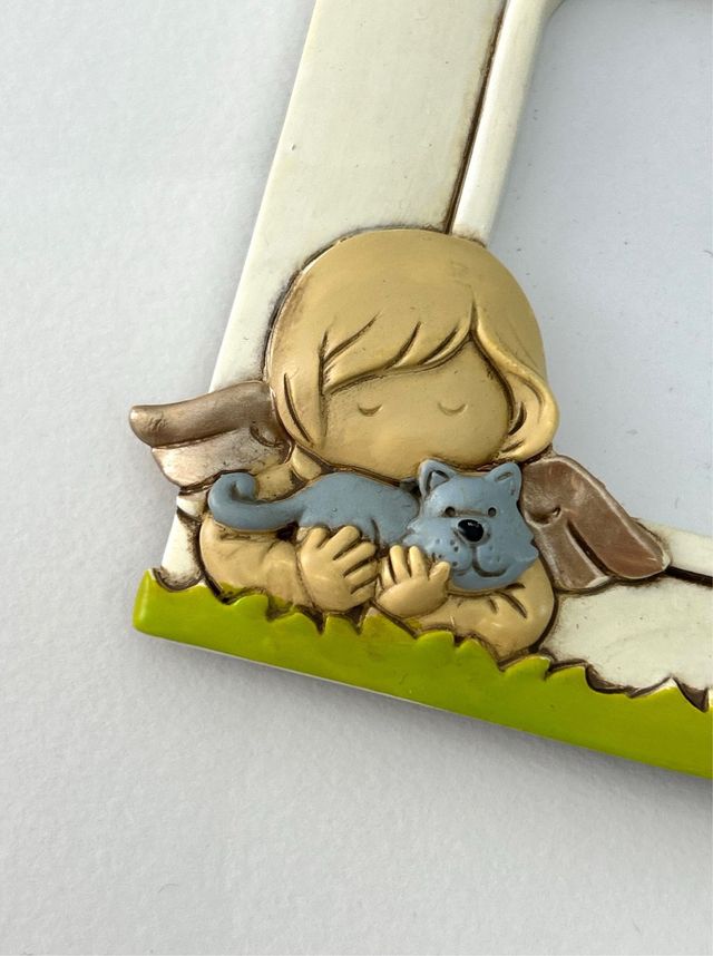 Nuova cornice per foto, ceramica