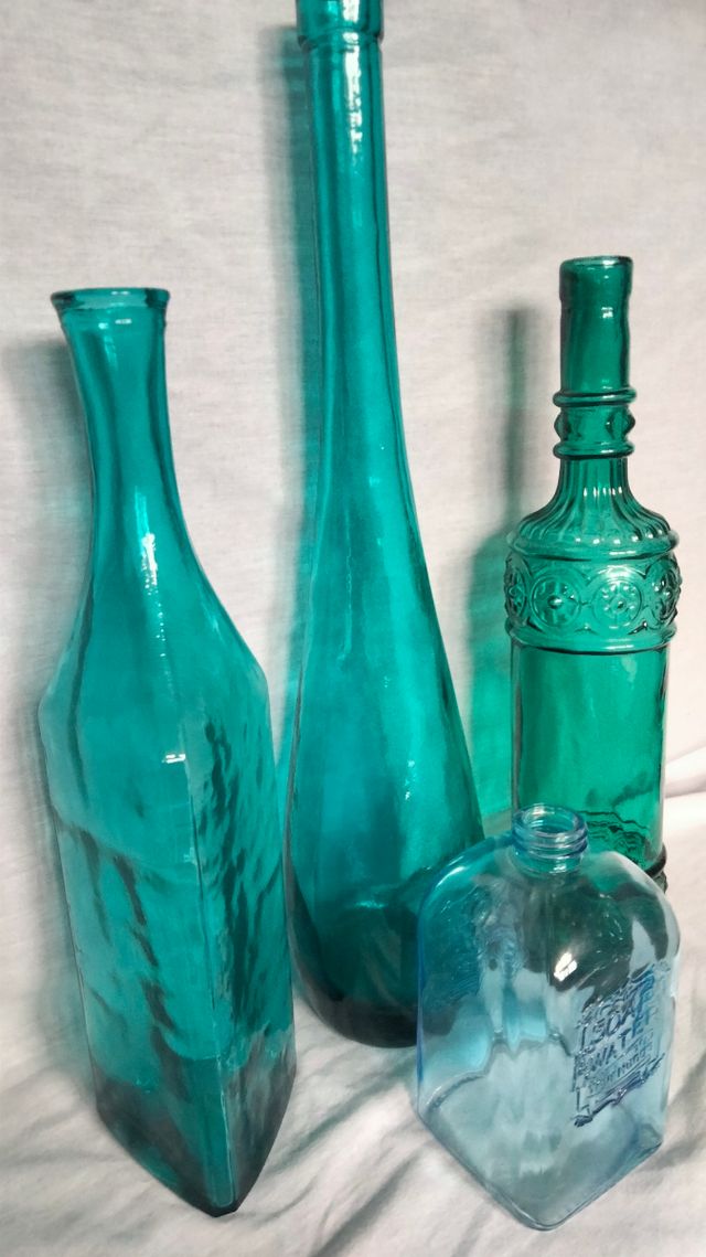 Bottiglie di vetro decorative Il 4 X 5€.