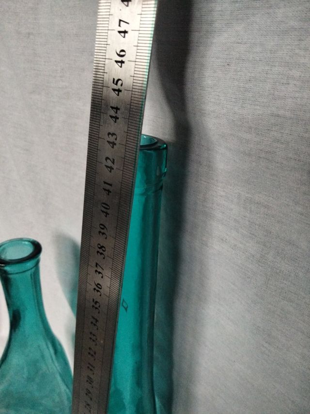 Bottiglie di vetro decorative Il 4 X 5€.