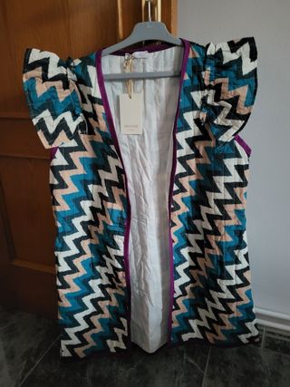 Chaleco con hombreras