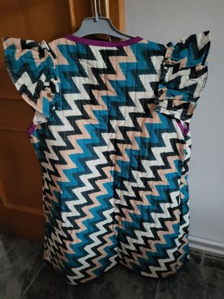 Chaleco con hombreras