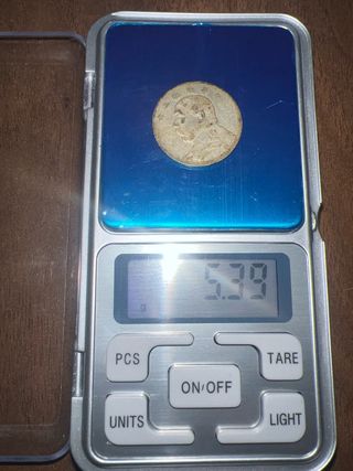 Moneda china plata