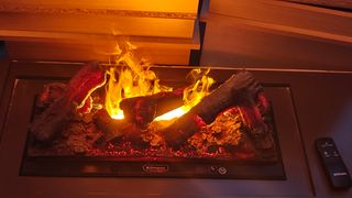 Mueble tv con chimenea de vapor