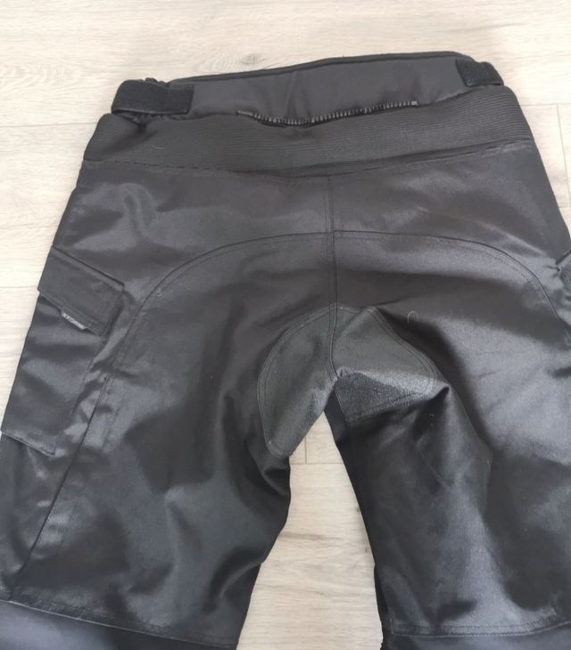 Calças para motociclista